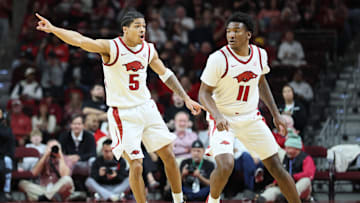 Dec 6, 2025; North Little Rock, Arkansas, USA; Arkansas Razorbacks guard Darius Acuff Jr (5) and wing Karter Knox (11) during the second half against the Fresno State Bulldogs at Simmons Bank Arena. Arkansas won 82-58. Mandatory Credit: Nelson Chenault-Imagn Images