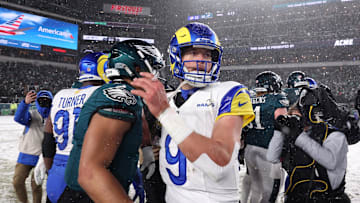 Jan 19, 2025; Philadelphia, Pennsylvania, USA; Philadelphia Eagles quarterback Jalen Hurts (1) greets Los Angeles Rams quarterback Matthew Stafford (9) after their game in a 2025 NFC divisional round game at Lincoln Financial Field. Mandatory Credit: Bill Streicher-Imagn Images