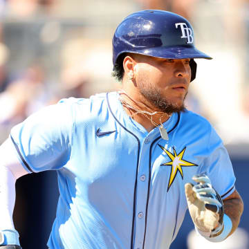 Feb 27, 2024; Port Charlotte, Florida, USA;  Tampa Bay Rays designated hitter Harold Ramirez (43) singles during the fourth inning against the New York Yankees at Charlotte Sports Park.