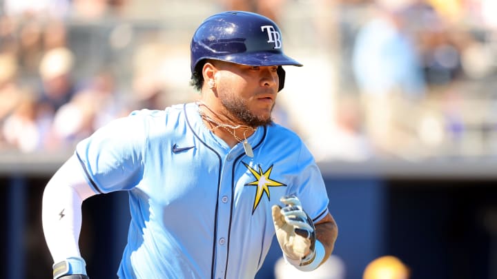 Feb 27, 2024; Port Charlotte, Florida, USA;  Tampa Bay Rays designated hitter Harold Ramirez (43) singles during the fourth inning against the New York Yankees at Charlotte Sports Park.