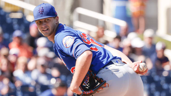 Feb 25, 2023; West Palm Beach, Florida, USA; New York Mets starting pitcher Eric Orze (92) checks the runner at first base during the sixth inning against the Houston Astros at The Ballpark of the Palm Beaches. Mandatory Credit: Reinhold Matay-USA TODAY Sports