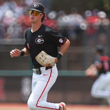 Georgia's Charlie Condon (24) takes the field at the start a NCAA Athens Regional baseball game against Army in Athens, Ga., on Friday, May 31, 2024. Georgia won 8-7.