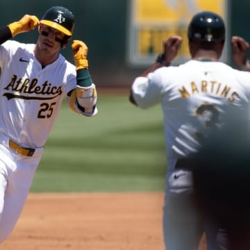 Jul 6, 2024; Oakland, California, USA; Oakland Athletics designated hitter Brent Rooker (25) celebrates his three-run home run against the Baltimore Orioles during the first inning at Oakland-Alameda County Coliseum. Mandatory Credit: D. Ross Cameron-USA TODAY Sports