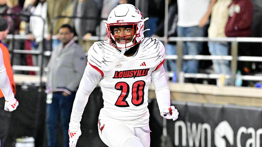Louisville Cardinals defensive back Tayon Holloway (20)