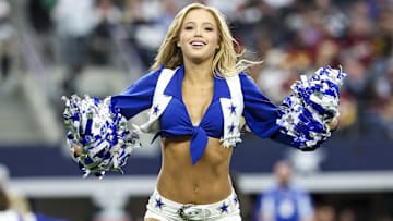 Dallas Cowboys cheerleader performs during the game against the Washington Commanders at AT&T Stadium.