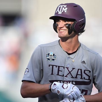 Texas A&M's Jace LaViolette (17) smiles during game three of the NCAA College World Series finals between Tennessee and Texas A&M at Charles Schwab Field in Omaha, Neb., on Monday, June 24, 2024.