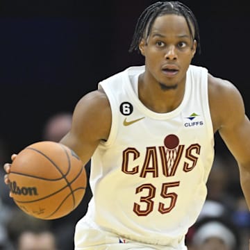 Oct 10, 2022; Cleveland, Ohio, USA; Cleveland Cavaliers forward Isaac Okoro (35) brings the ball up court in the third quarter against the Philadelphia 76ers at Rocket Mortgage FieldHouse. Mandatory Credit: David Richard-Imagn Images