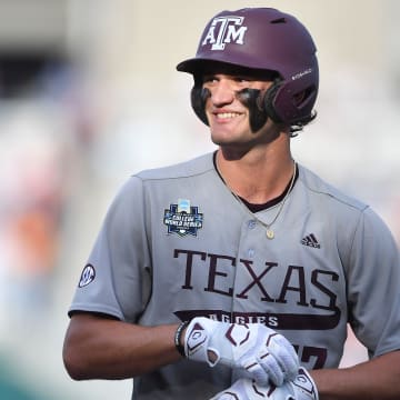 Texas A&M's Jace LaViolette (17) smiles during game three of the NCAA College World Series finals between Tennessee and Texas A&M at Charles Schwab Field in Omaha, Neb., on Monday, June 24, 2024.