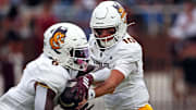 Sep 6, 2025; Starkville, Mississippi, USA; Arizona State Sun Devils quarterback Sam Leavitt (10) hands the ball off during warm ups prior to the game against the Mississippi State Bulldogs at Davis Wade Stadium at Scott Field. Mandatory Credit: Petre Thomas-Imagn Images