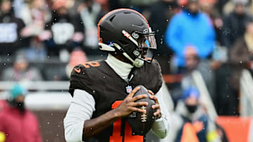 Dec 7, 2025; Cleveland, Ohio, USA; Cleveland Browns quarterback Shedeur Sanders (12) looks to throw a pass against the Tennessee Titans during the first quarter at Huntington Bank Field. Mandatory Credit: Ken Blaze-Imagn Images