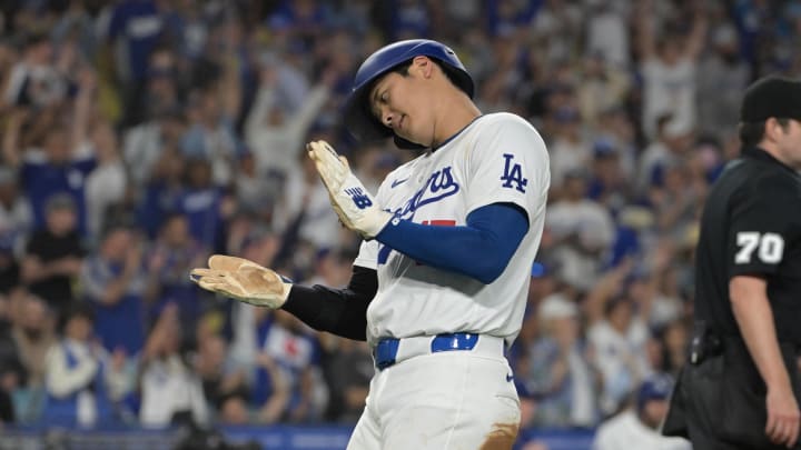 Los Angeles Dodgers designated hitter Shohei Ohtani (17) scores a run on a single by second baseman Gavin Lux (9) in the fifth inning against the Baltimore Orioles at Dodger Stadium on Aug 28.