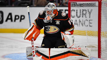 Jan 31, 2024; Anaheim, California, USA; Anaheim Ducks goaltender John Gibson (36) defends the goal against the San Jose Sharks during the first period at Honda Center. Mandatory Credit: Gary A. Vasquez-Imagn Images