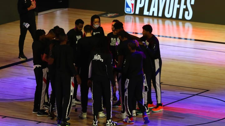 Sep 11, 2020; Lake Buena Vista, Florida, USA; Members of the LA Clippers huddle before the first half of game five against the Denver Nuggets in the second round of the 2020 NBA Playoffs at ESPN Wide World of Sports Complex.