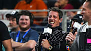 Comedian Tony Hinchcliffe laughs on the sideline during the College Football Playoff semifinal game between the Texas Longhorns and Ohio State in the Cotton Bowl at AT&T Stadium.