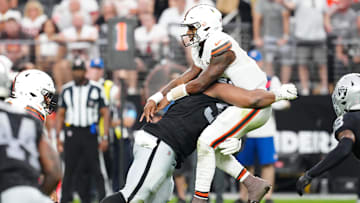 Sep 29, 2024; Paradise, Nevada, USA; Las Vegas Raiders defensive tackle Christian Wilkins (94) hits Cleveland Browns quarterback Deshaun Watson (4) during the fourth quarter at Allegiant Stadium. Mandatory Credit: Stephen R. Sylvanie-Imagn Images