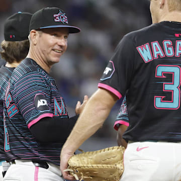 Jun 21, 2025; Miami, Florida, USA;  Miami Marlins manager Clayton McCullough (86) makes a pitching change against the Atlanta Braves during the fifth inning at loanDepot Park. Mandatory Credit: Rhona Wise-Imagn Images