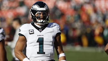 Dec 22, 2024; Landover, Maryland, USA; Philadelphia Eagles quarterback Jalen Hurts (1) stands on the field during warmup prior to the game against the Washington Commanders at Northwest Stadium. Mandatory Credit: Geoff Burke-Imagn Images