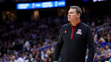 Mar 27, 2025; Newark, NJ, USA; Arizona Wildcats head coach Tommy Lloyd during the first half against the Duke Blue Devils during an East Regional semifinal of the 2025 NCAA tournament at Prudential Center. Mandatory Credit: Vincent Carchietta-Imagn Images