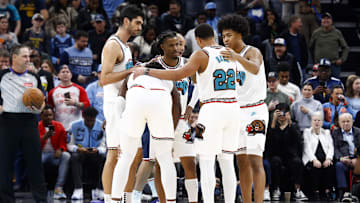 Dec 23, 2024; Memphis, Tennessee, USA; Memphis Grizzlies forward Santi Aldama (7), forward Jaren Jackson Jr. (13), guard Ja Morant (12), guard Desmond Bane (22) and forward Jaylen Wells (0) huddle during the fourth quarter against the Los Angeles Clippers at FedExForum. Mandatory Credit: Petre Thomas-Imagn Images