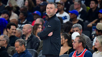 Apr 24, 2025; Inglewood, California, USA; Denver Nuggets interim head coach David Adelman watches game action against the Los Angeles Clippers during the first half of game three in the first round for the 2024 NBA Playoffs at Intuit Dome. Mandatory Credit: Gary A. Vasquez-Imagn Images