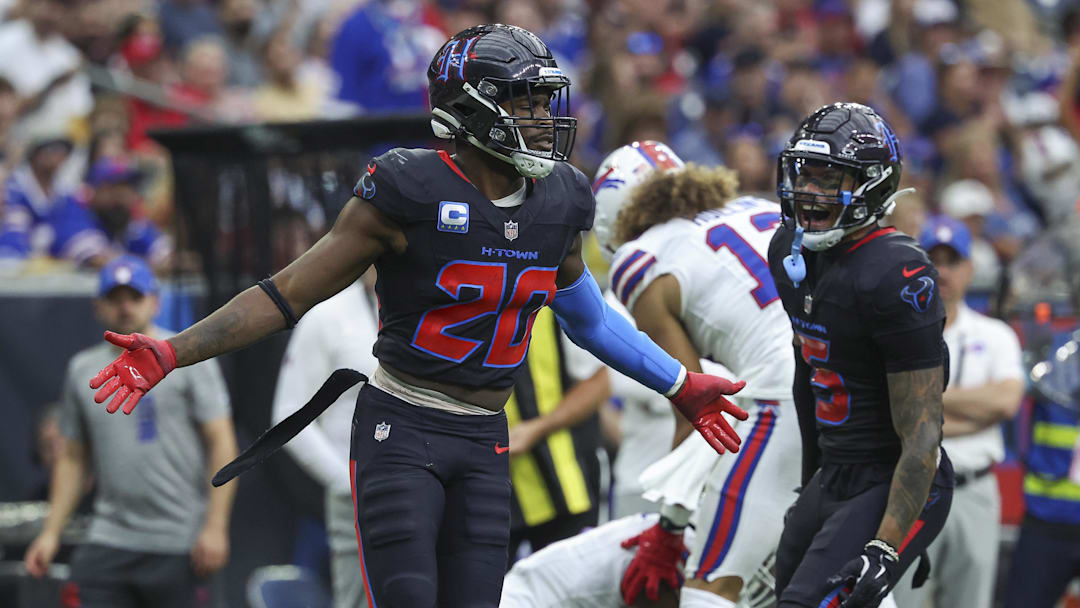 Oct 6, 2024; Houston, Texas, USA; Houston Texans safety Jimmie Ward (20) reacts after making a tackle during the second quarter against the Buffalo Bills at NRG Stadium. Mandatory Credit: Troy Taormina-Imagn Images