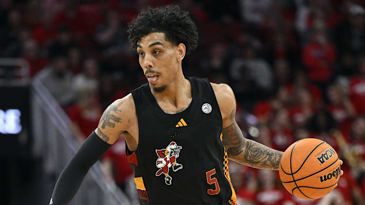 Feb 8, 2025; Louisville, Kentucky, USA; Louisville Cardinals guard Terrence Edwards Jr. (5) dribbles against the Miami (Fl) Hurricanes during the second half at KFC Yum! Center. Louisville defeated Miami 88-78. Feb 8, 2025; Louisville, Kentucky, USA; Louisville Cardinals guard Terrence Edwards Jr. (5) dribbles against the Miami (Fl) Hurricanes during the second half at KFC Yum! Center. Louisville defeated Miami 88-78.