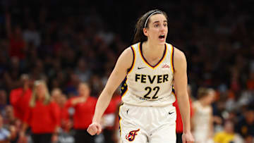 Jun 30, 2024; Phoenix, Arizona, USA; Indiana Fever guard Caitlin Clark (22) against the Phoenix Mercury during a WNBA game at Footprint Center. Mandatory Credit: Mark J. Rebilas-Imagn Images