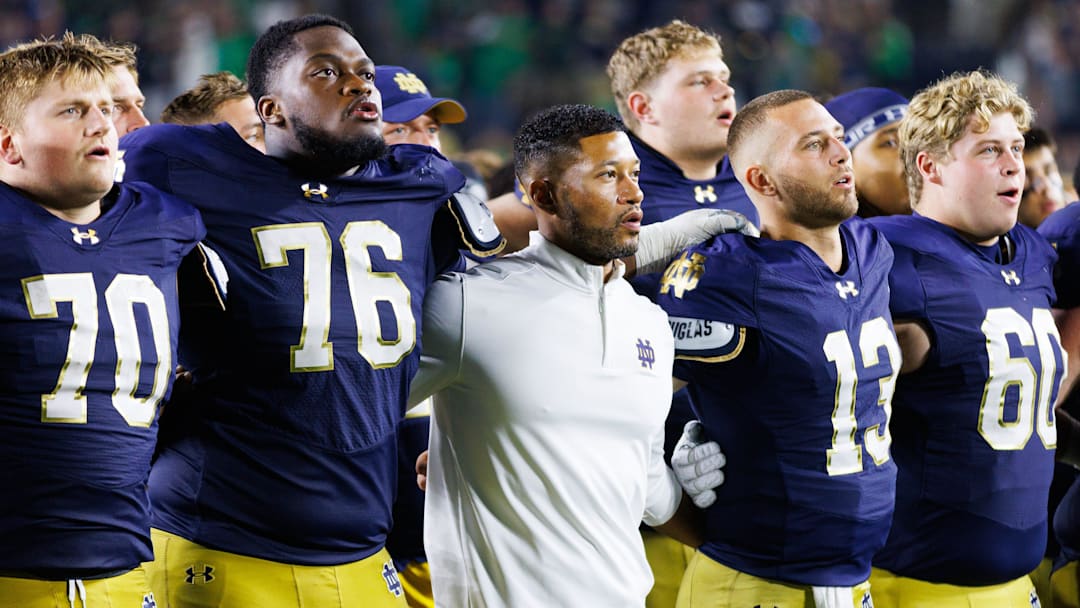 Notre Dame head coach Marcus Freeman celebrates with his players after winning a NCAA football game 56-30 against Purdue at Notre Dame Stadium on Saturday, Sept. 20, 2025, in South Bend.