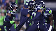 Oct 20, 2025; Seattle, Washington, USA; Seattle Seahawks linebacker Uchenna Nwosu (7) celebrates after tackling Houston Texans quarterback C.J. Stroud (7) for a loss during the first quarter at Lumen Field.