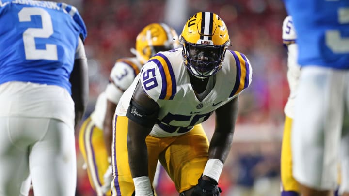 Sep 30, 2023; Oxford, Mississippi, USA; LSU Tigers offensive linemen Emery Jones Jr. (50) lines up prior to the snap during the second half against the Mississippi Rebels at Vaught-Hemingway Stadium. Mandatory Credit: Petre Thomas-USA TODAY Sports