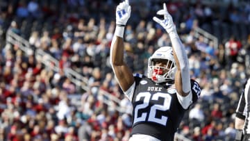 Dec 23, 2023; Birmingham, AL, USA; Duke Blue Devils running back Jaylen Coleman (22) reacts after a touchdown run during the first half against the Troy Trojans at Protective Stadium. Mandatory Credit: Petre Thomas-USA TODAY Sports