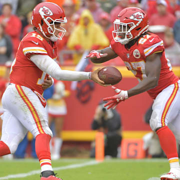 Oct 7, 2018; Kansas City, MO, USA; Kansas City Chiefs quarterback Patrick Mahomes (15) hands off to running back Kareem Hunt (27) during the game against the Jacksonville Jaguars at Arrowhead Stadium. Mandatory Credit: Denny Medley-Imagn Images