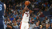 Oct 24, 2025; Memphis, Tennessee, USA; Miami Heat center Bam Adebayo (13) shoots for three during the first quarter against the Memphis Grizzlies at FedExForum. Mandatory Credit: Petre Thomas-Imagn Images