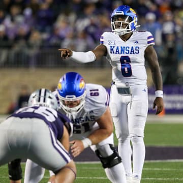 Oct 26, 2024; Manhattan, Kansas, USA; Kansas Jayhawks quarterback Jalon Daniels (6) calls a play during the third quarter against the Kansas State Wildcats at Bill Snyder Family Football Stadium. Mandatory Credit: Scott Sewell-Imagn Images