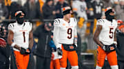 Cincinnati Bengals wide receiver Ja'Marr Chase (1), quarterback Joe Burrow (9) and wide receiver Tee Higgins (5) take the field as captains for the coin toss before the first quarter of the NFL Week 18 game between the Pittsburgh Steelers and the Cincinnati Bengals at Acrisure Stadium in Pittsburgh on Saturday, Jan. 4, 2025.