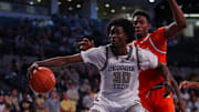 Mar 4, 2025; Atlanta, Georgia, USA; Georgia Tech Yellow Jackets forward Ibrahim Souare (30) handles the ball against the Miami Hurricanes in the second half at McCamish Pavilion. Mandatory Credit: Brett Davis-Imagn Images