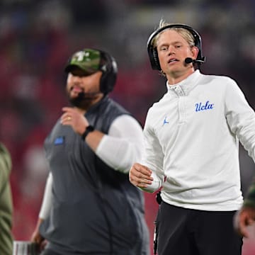 Nov 8, 2025; Pasadena, California, USA; UCLA Bruins offensive coordinator Jerry Neuheisel during the first half at the Rose Bowl. Mandatory Credit: Gary A. Vasquez-Imagn Images