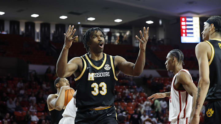 Mar 5, 2025; Norman, Oklahoma, USA; Missouri Tigers center Josh Gray (33) reacts after a play against the Oklahoma Sooners during the second half at Lloyd Noble Center. Mandatory Credit: Alonzo Adams-Imagn Images