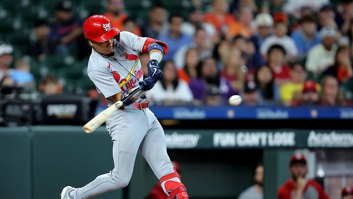 Apr 19, 2026; Houston, Texas, USA; St. Louis Cardinals shortstop Masyn Winn (0) hits a three-run triple to left field against the Houston Astros during the 10th inning at Daikin Park. Mandatory Credit: Erik Williams-Imagn Images