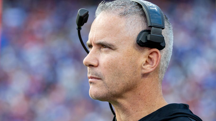 Florida State head coach Mike Norvell walks the sidelines during a game.