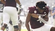 Oct 28, 2023; College Station, Texas, USA; Texas A&M Aggies running back Amari Daniels (4) takes a knee before a game against South Carolina Gamecocks at Kyle Field. Mandatory Credit: Dustin Safranek-Imagn Images