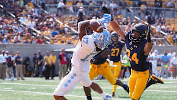Sep 1, 2018; Berkeley, CA, USA; California Golden Bears cornerback Camryn Bynum (24) prevents a pass intended for North Carolina Tar Heels wide receiver Anthony Ratliff-Williams (17) during the third quarter at California Memorial Stadium. 