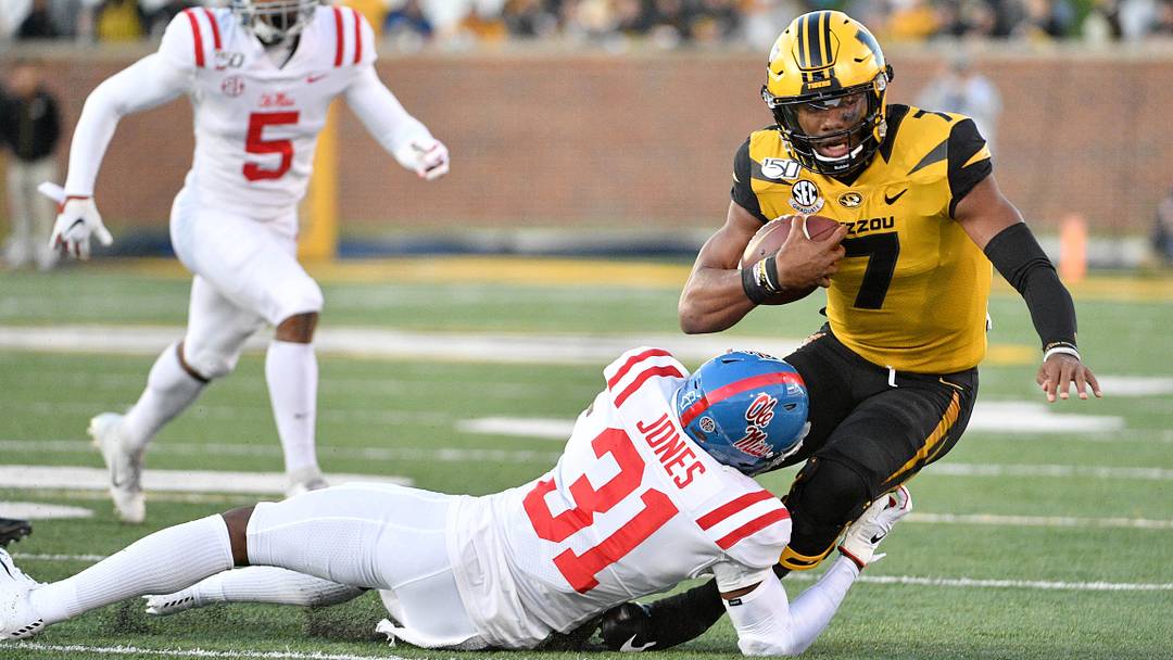Missouri Tigers running back Larry Rountree III is tackled by Mississippi Rebels defensive back Jaylon Jones during the first half at Memorial Stadium. Missouri Tigers running back Larry Rountree III is tackled by Mississippi Rebels defensive back Jaylon Jones during the first half at Memorial Stadium.