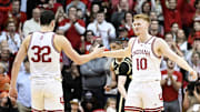Hoosiers guard Trey Galloway, left, and forward Luke Goode celebrate after a play against the Boilermakers.
