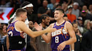 Nov 10, 2025; Phoenix, Arizona, USA; Phoenix Suns guard Grayson Allen (8) celebrates with Collin Gillespie after being pulled from the game after setting the franchise record for three pointers in a game against the New Orleans Pelicans in the second half at the Mortgage Matchup Center. Mandatory Credit: Mark J. Rebilas-Imagn Images