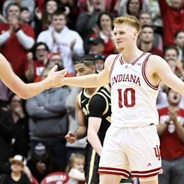 Indiana's Trey Galloway (32) and Luke Goode (10) celebrate against Purdue at Simon Skjodt Assembly Hall. 