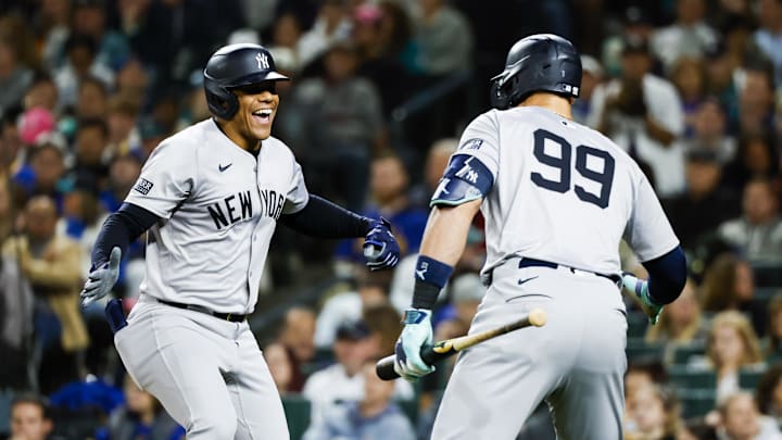 New York Yankees right fielder Juan Soto celebrates a two-run home run against the Seattle Mariners with Aaron Judge.