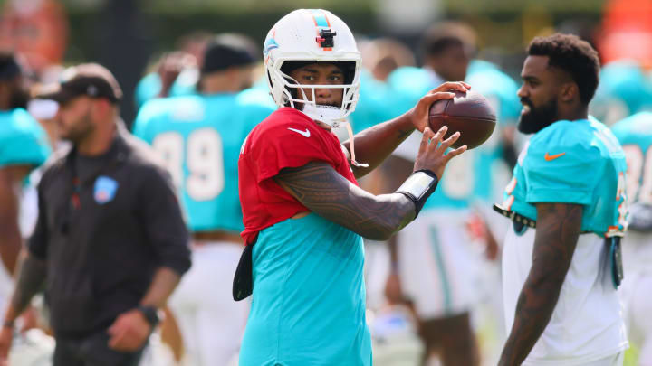 Miami Dolphins quarterback Tua Tagovailoa (1) throws the football during a joint practice with the Atlanta Falcons at Baptist Health Training Complex.