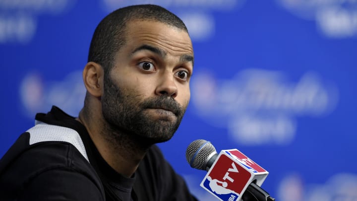 Jun 4, 2014; San Antonio, TX, USA; San Antonio Spurs guard Tony Parker (9) speaks to the media after practice before game one of the 2014 NBA Finals against the Miami Heat at the AT&T Center. Mandatory Credit: Bob Donnan-USA TODAY Sports