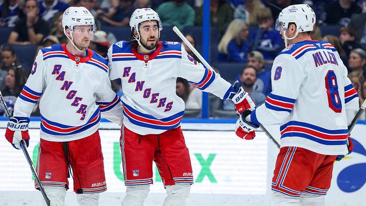 Apr 15, 2026; Tampa, Florida, USA; New York Rangers center Mika Zibanejad (93) (center) reacts with left wing Alexis Lafrenière (13) (left) and center J.T. Miller (8) (right) after scoring a goal against the Tampa Bay Lightning in the second period at Benchmark International Arena. Mandatory Credit: Nathan Ray Seebeck-Imagn Images Apr 15, 2026; Tampa, Florida, USA; New York Rangers center Mika Zibanejad (93) (center) reacts with left wing Alexis Lafrenière (13) (left) and center J.T. Miller (8) (right) after scoring a goal against the Tampa Bay Lightning in the second period at Benchmark International Arena. Mandatory Credit: Nathan Ray Seebeck-Imagn Images